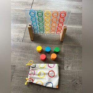 Lovevery Drop and Match dot game from The Helper